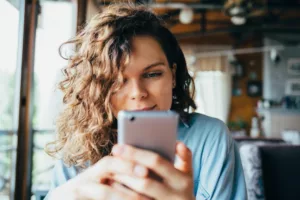 Woman looking at her phone.